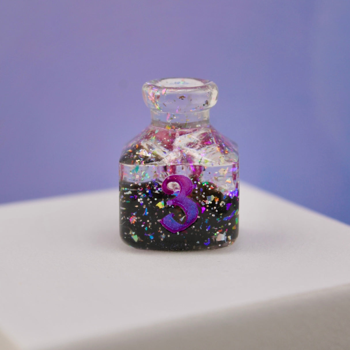 Space Glimmer Resin Dice D4 Bottle Style Single